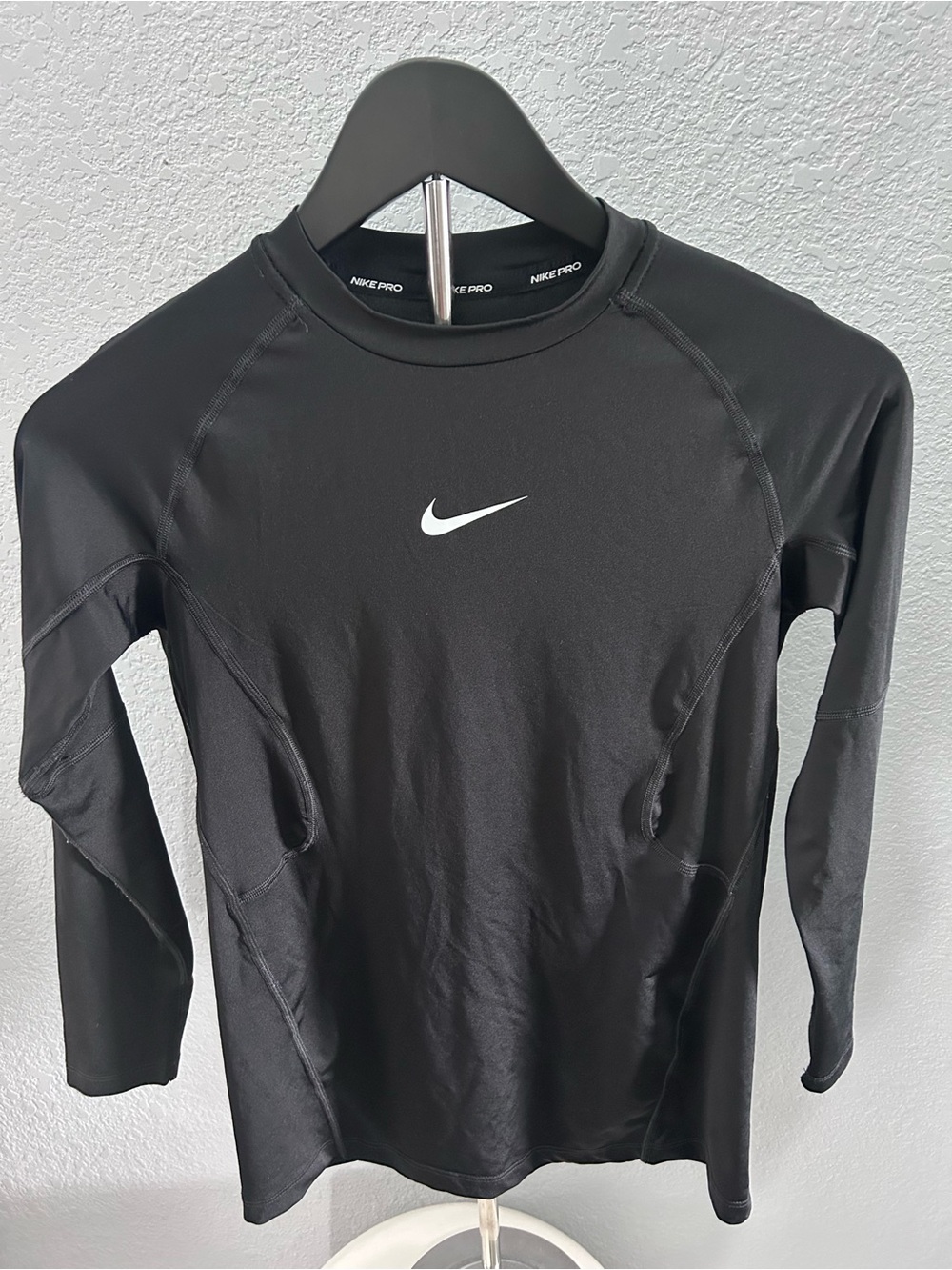 Nike Black Long Sleeve Dri-FIT Performance Top with White Swoosh
